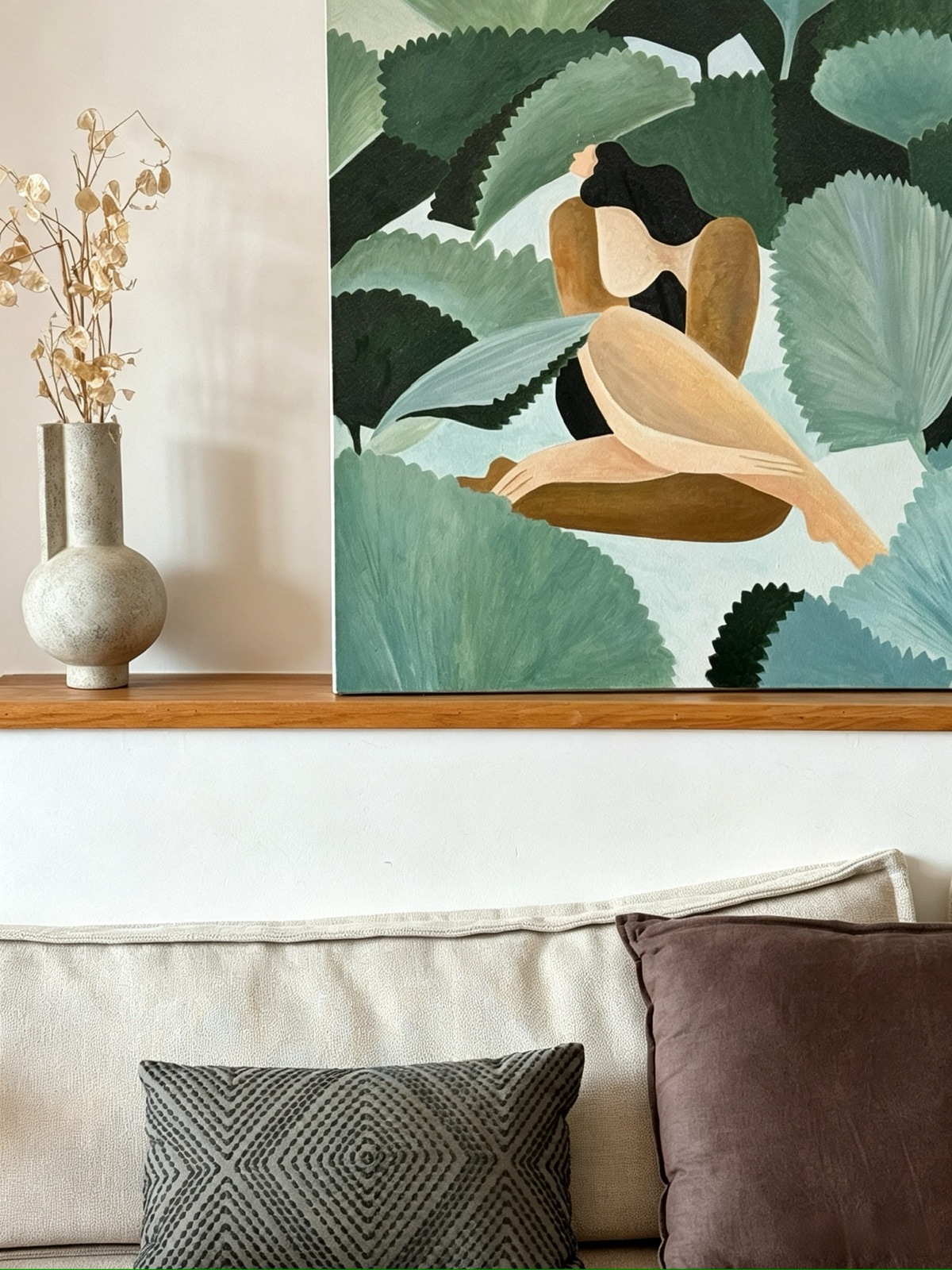 An original painting by Nancy displayed inside a room