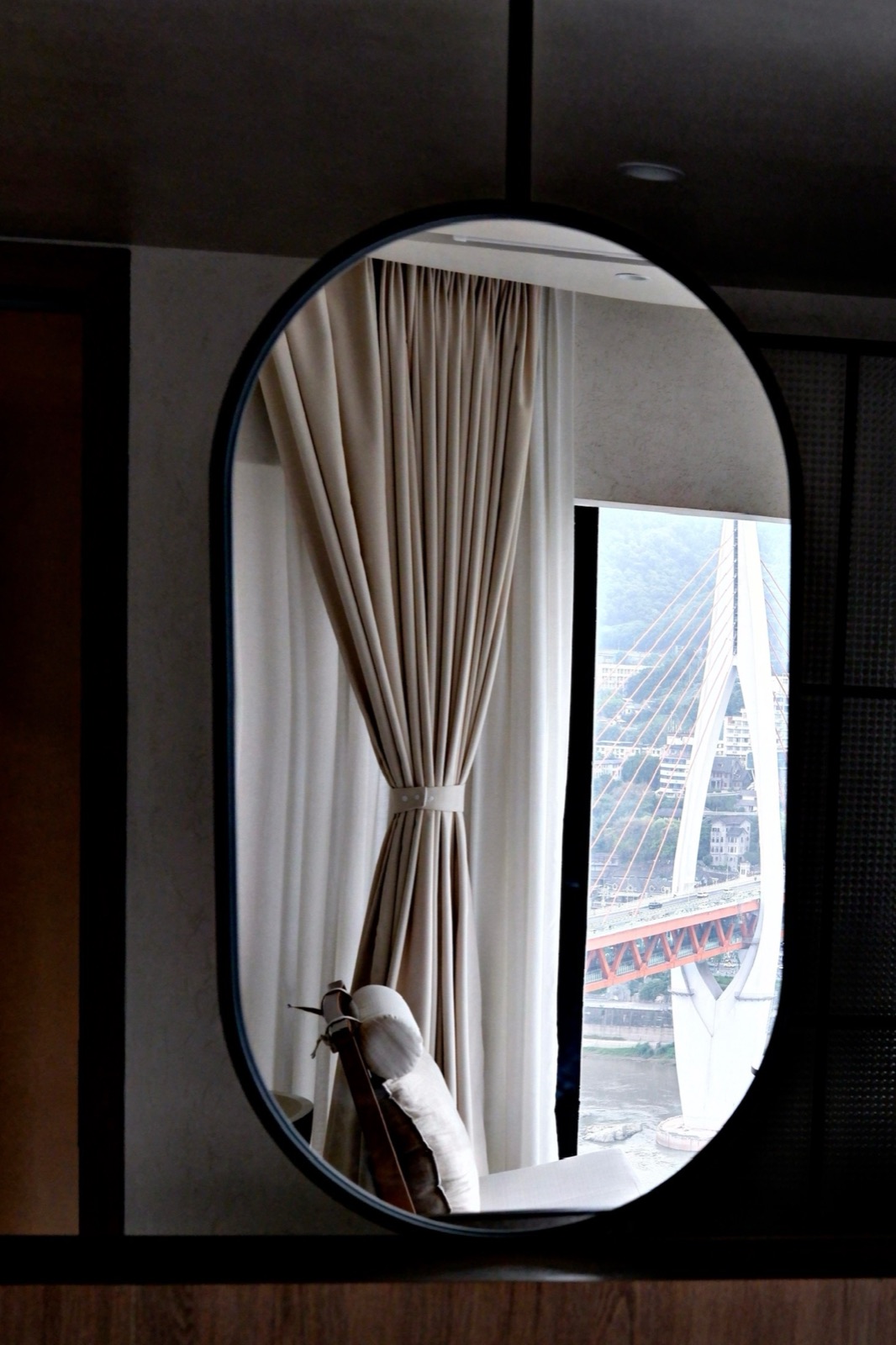 Dongshuimen Bridge reflected in a guest-room mirror